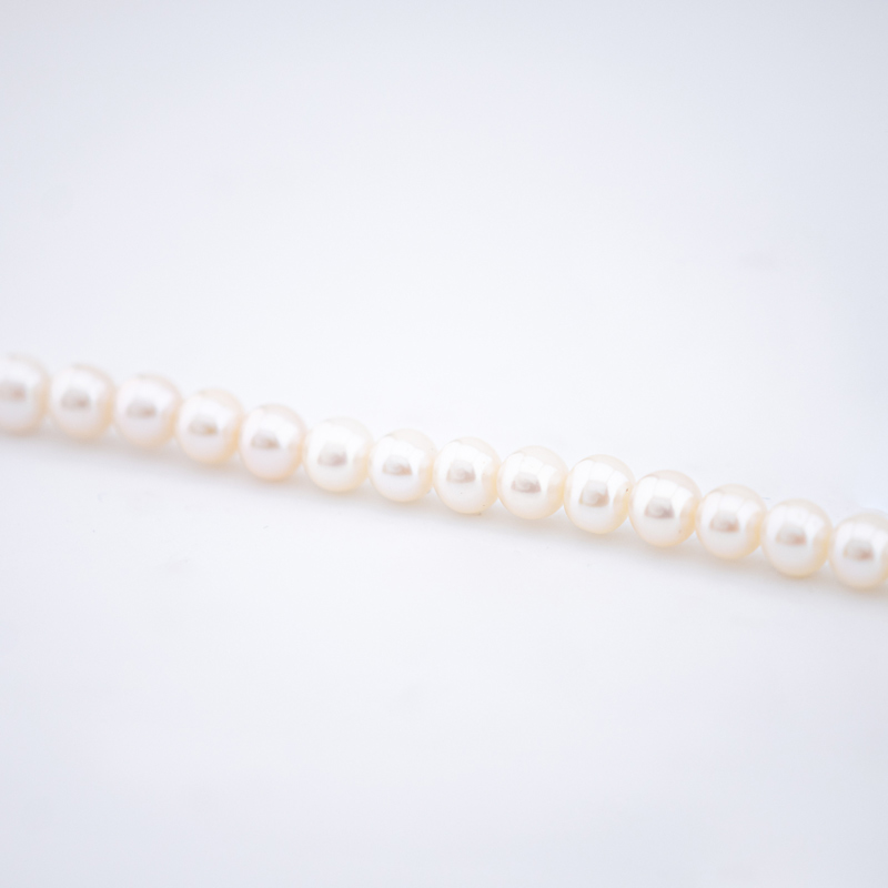 dettaglio bracciale comete gioielli oro e perle brq 112 s