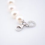 dettaglio chiusura bracciale comete gioielli oro e perle brq 112 s